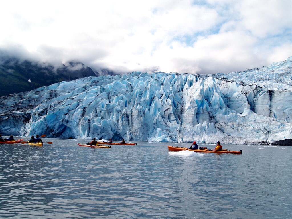 2 kayaks in front of a glacier