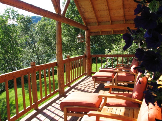 a nice veranda with deck chairs