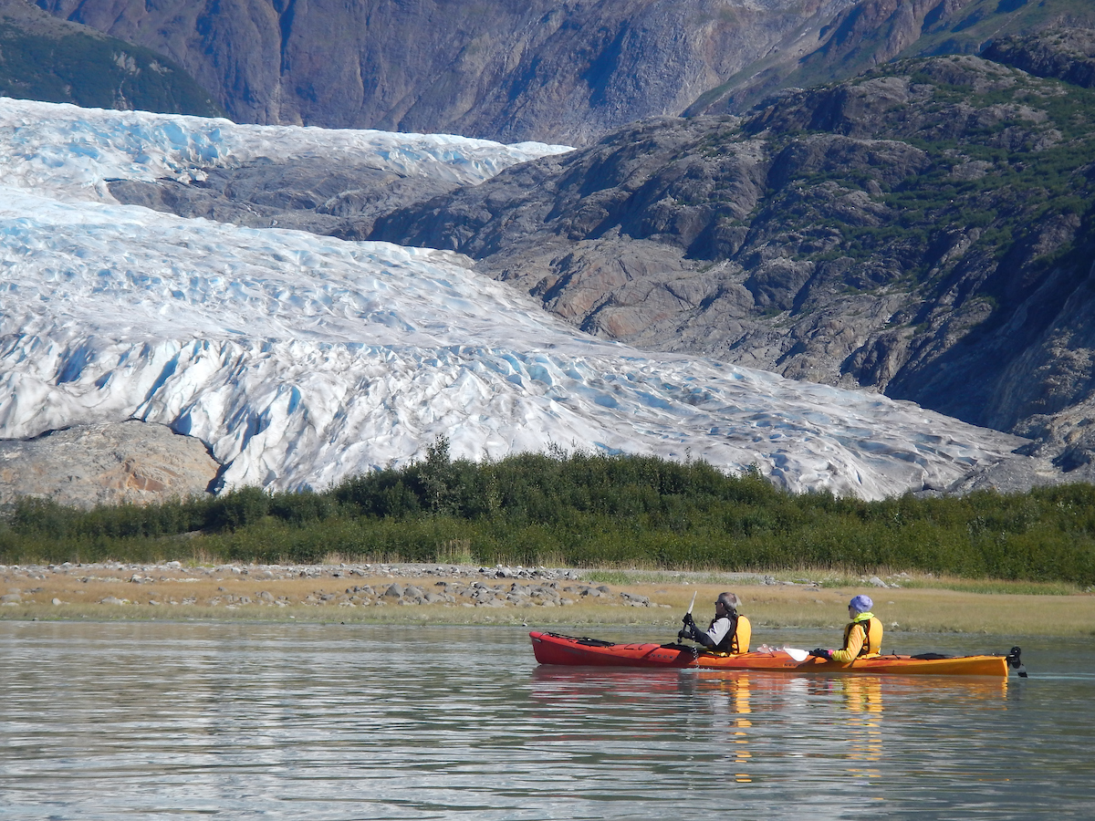 uncruise Kayaking next to a glacier